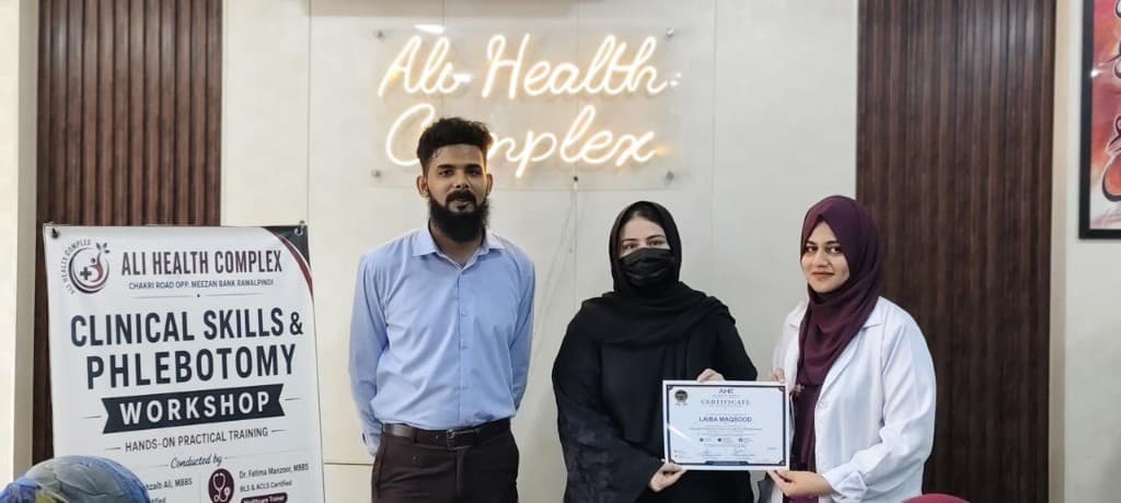 Participant receiving her certificate of participation